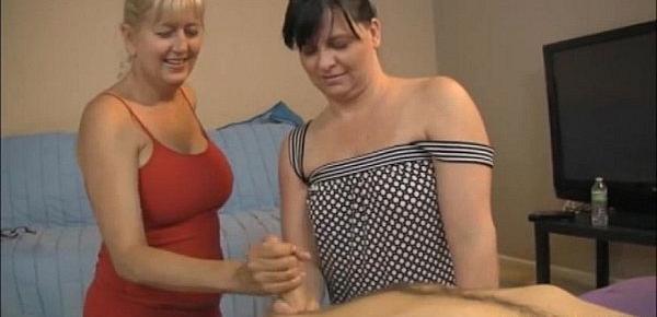  Two Milfs Jerking A Naked Guy